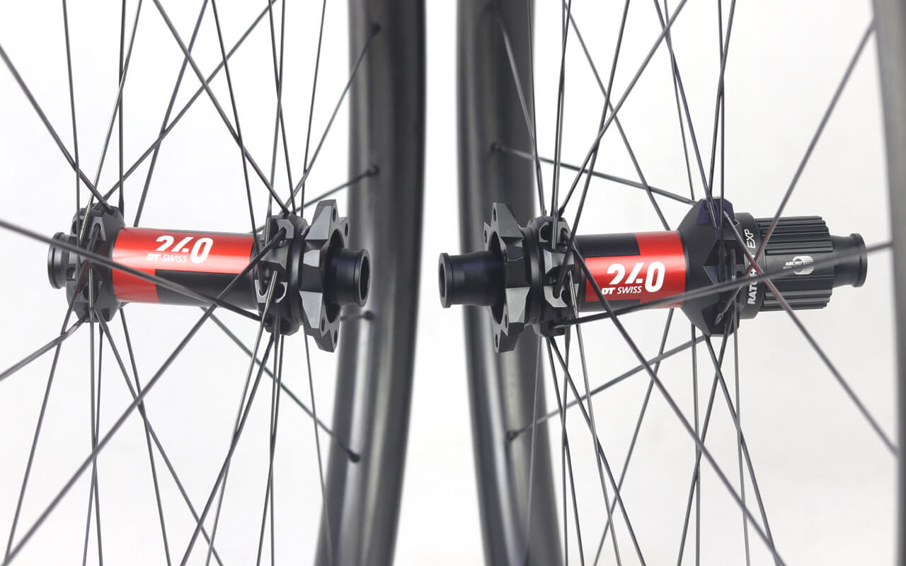 ultra light carbon MTB wheels built with DT Swiss 240 EXP boost hubs center lock straight pull sapim cx-ray spokes