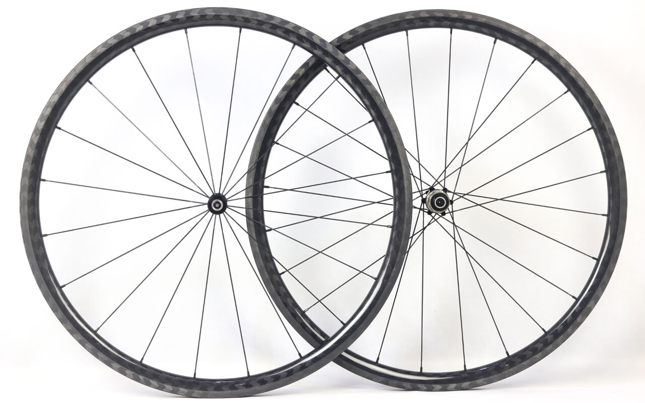 30mm carbon clincher wheels build with Novatec non disc hubs 