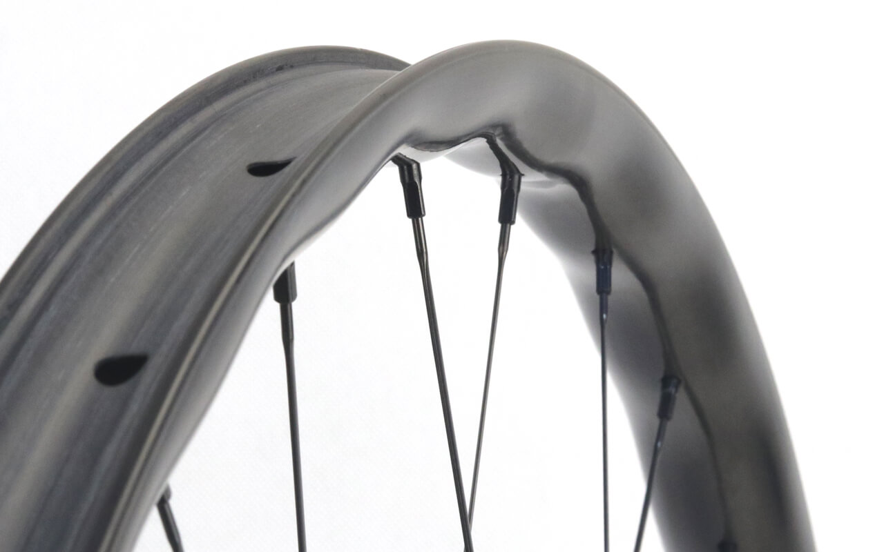 asymmetric wave shape  carbon mtb wheels 